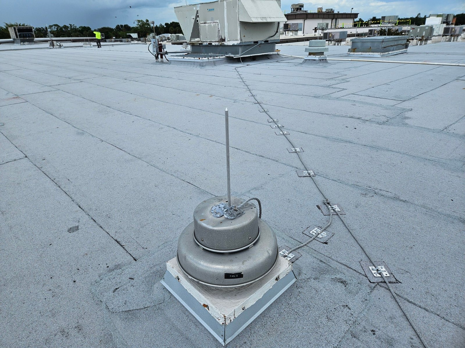 Storm-damaged rooftop exhaust unit on a commercial building inspected by MBS Florida