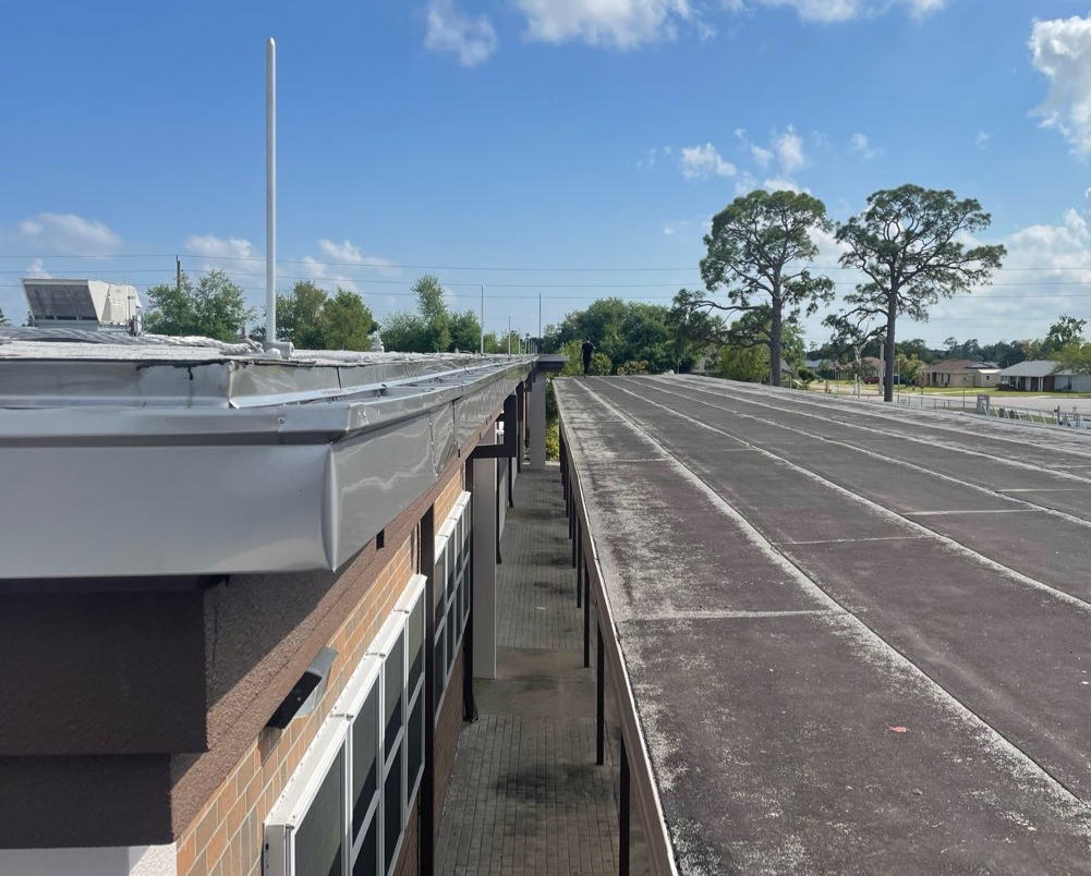 Storm-damaged seam on a commercial roof inspected by MBS Florida