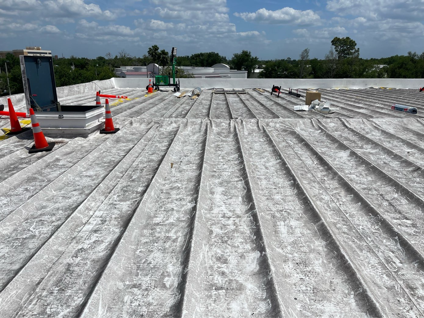 Recent storm damage on a commercial roof during a Southwest Florida inspection
