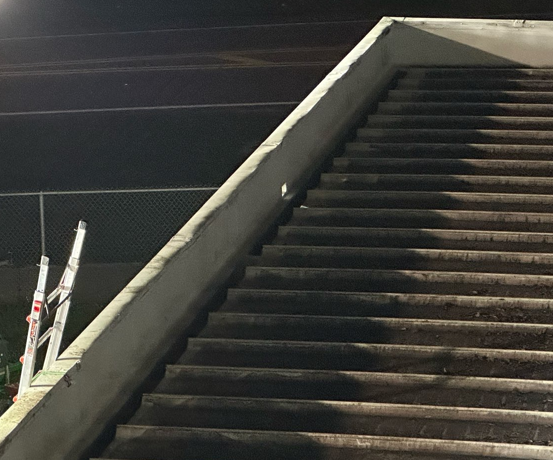 Storm damage to commercial roof membrane documented during onsite inspection in Southwest Florida